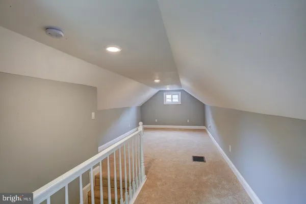 a view of hallway with stairs
