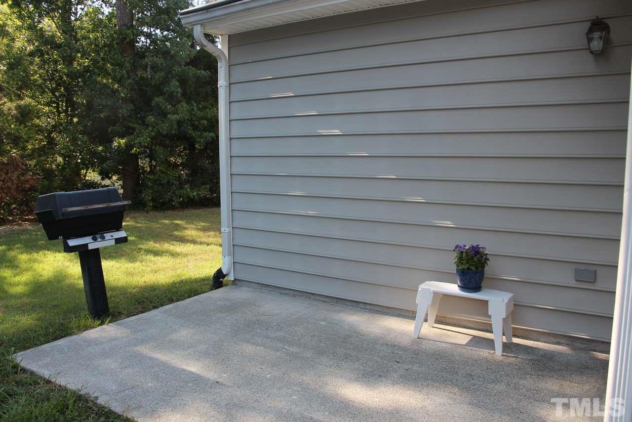 10 Pendleton Court Durham, NC 27713 - Photo 14 of 16 a view of a bench in a patio