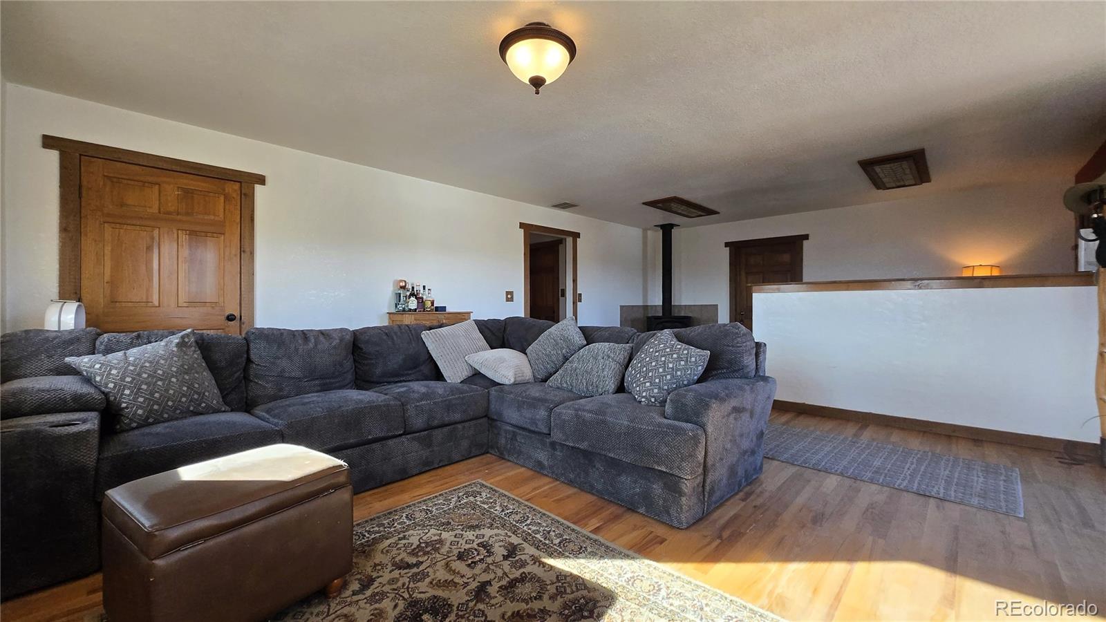 957 Vega Road Walsenburg, CO 81089 - Photo 16 of 30 a living room with furniture and a window