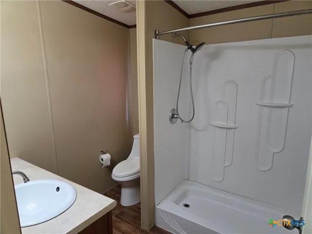 a bathroom with a bath tub and a shower