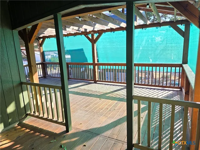 a view of a porch with a yard