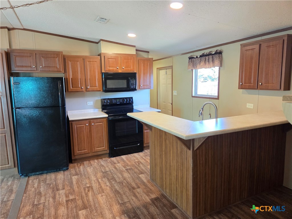5504 Jib Lane Temple, TX 76502 - Photo 2 of 36 a kitchen with stainless steel appliances a refrigerator sink and microwave