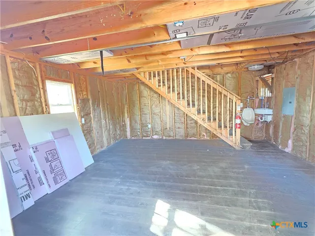 a view of entryway with stairs