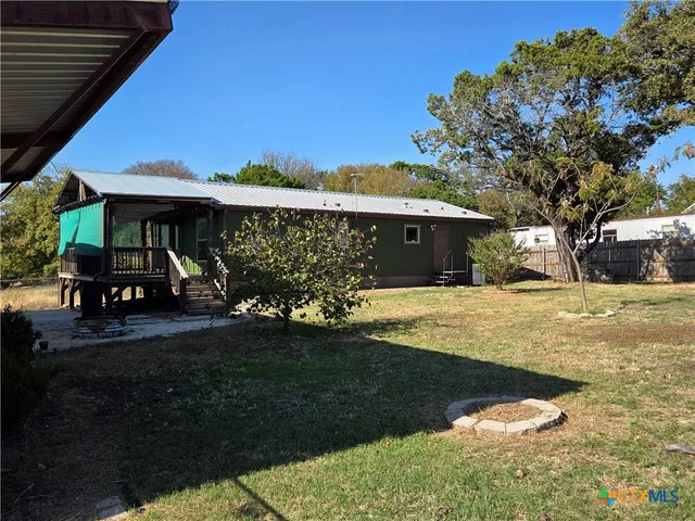 a view of a lake from a yard