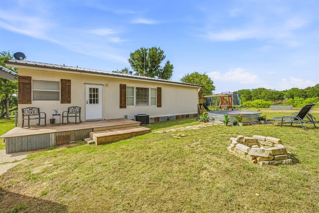 151 High Point Road Weatherford, TX 76088 - Photo 22 of 40 a front view of house with yard
