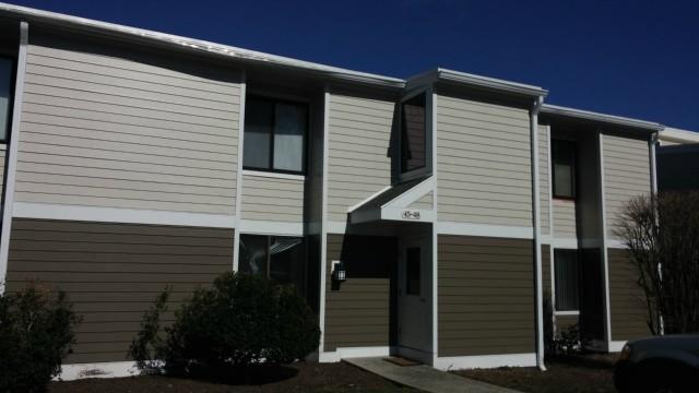 46 Lawson Lane, Unit 46 Ridgefield, CT 06877 - Photo 1 of 1 a view of a house with a door