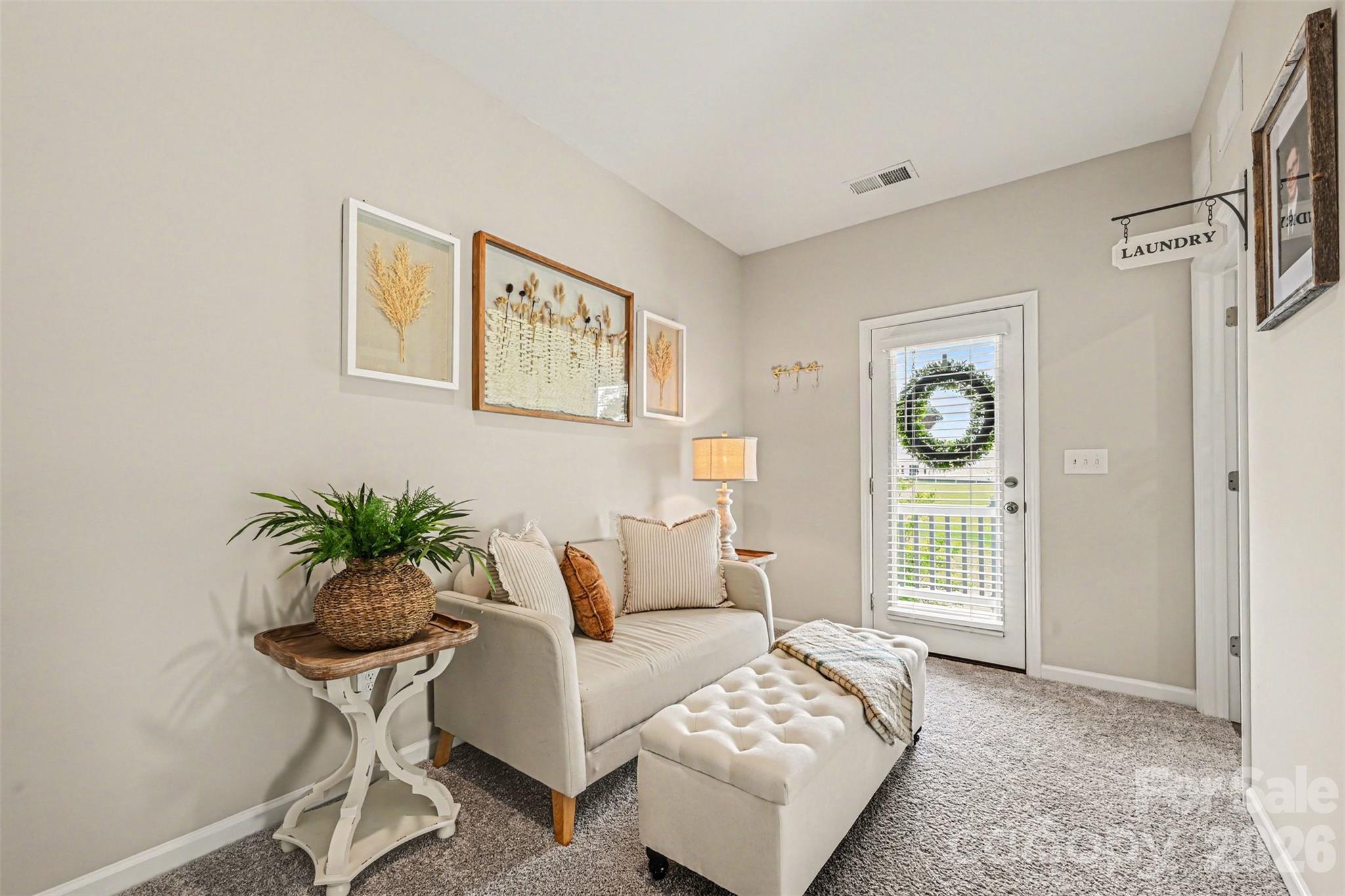 425 Kiser Lane Locust, NC 28097 - Photo 14 of 25 a living room with furniture and a window