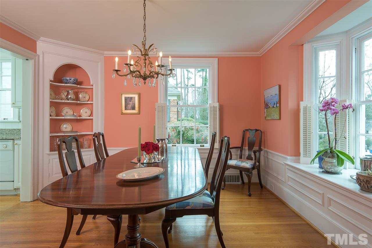 2717 Cambridge Road Raleigh, NC 27608 - Photo 3 of 21 a view of a dining room with furniture window and wooden floor