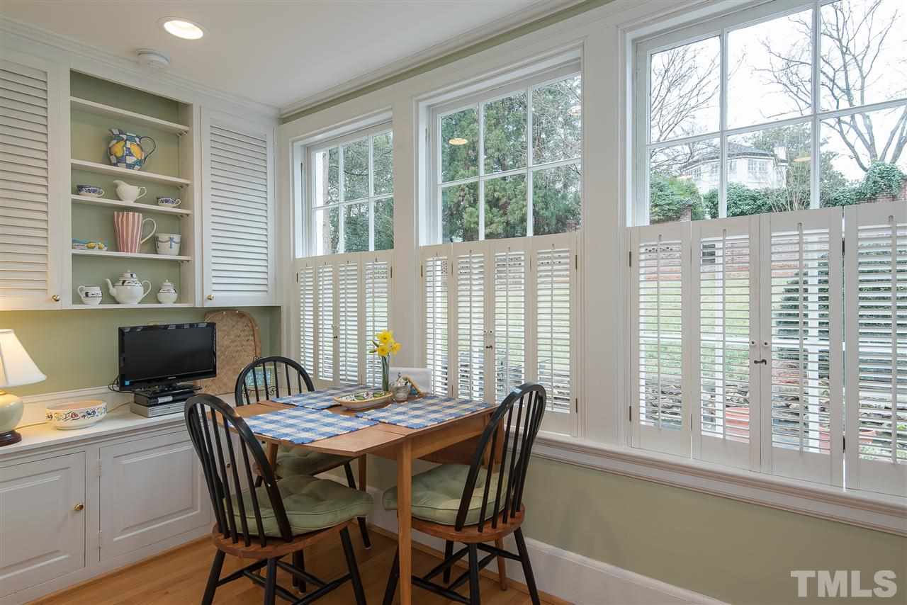 2717 Cambridge Road Raleigh, NC 27608 - Photo 6 of 21 a view of a dining room with furniture window and outside view