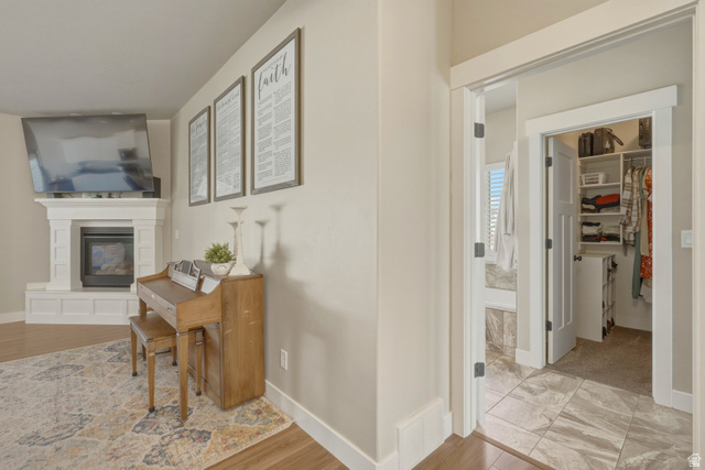 836 South 250 West Vernal, UT 84078 - Photo 6 of 56 Hall with baseboards and light wood finished floors