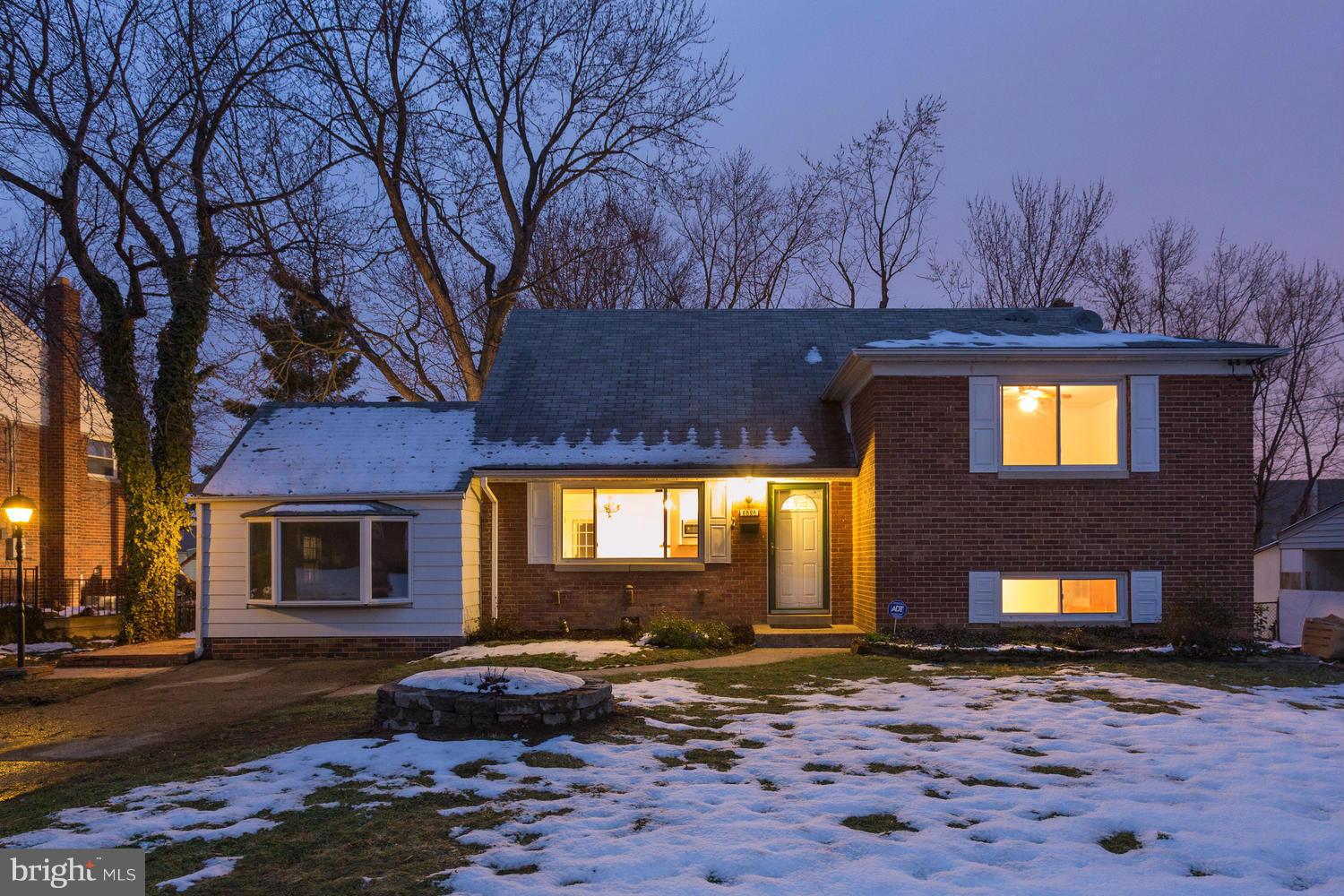 6826 Inverness Drive Springfield, VA 22150 - Photo 1 of 24 Exterior Front at Winter twilight