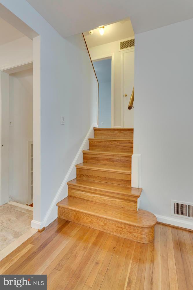 6826 Inverness Drive Springfield, VA 22150 - Photo 13 of 24 Stairs to upper bedrooms
