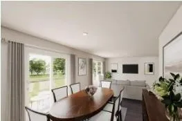 a dining room with furniture and wooden floor