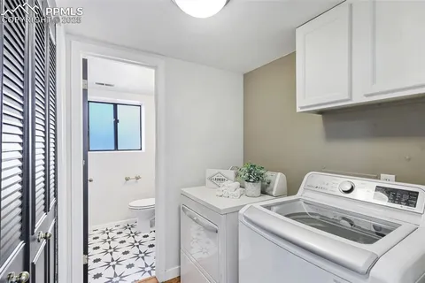 a bathroom with a sink toilet and vanity