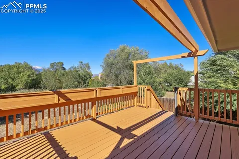 a view of balcony with furniture