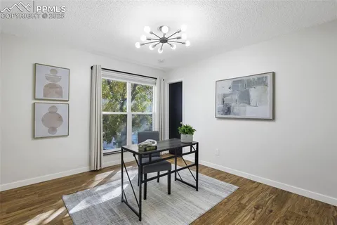a workspace with wooden floor and a workspace
