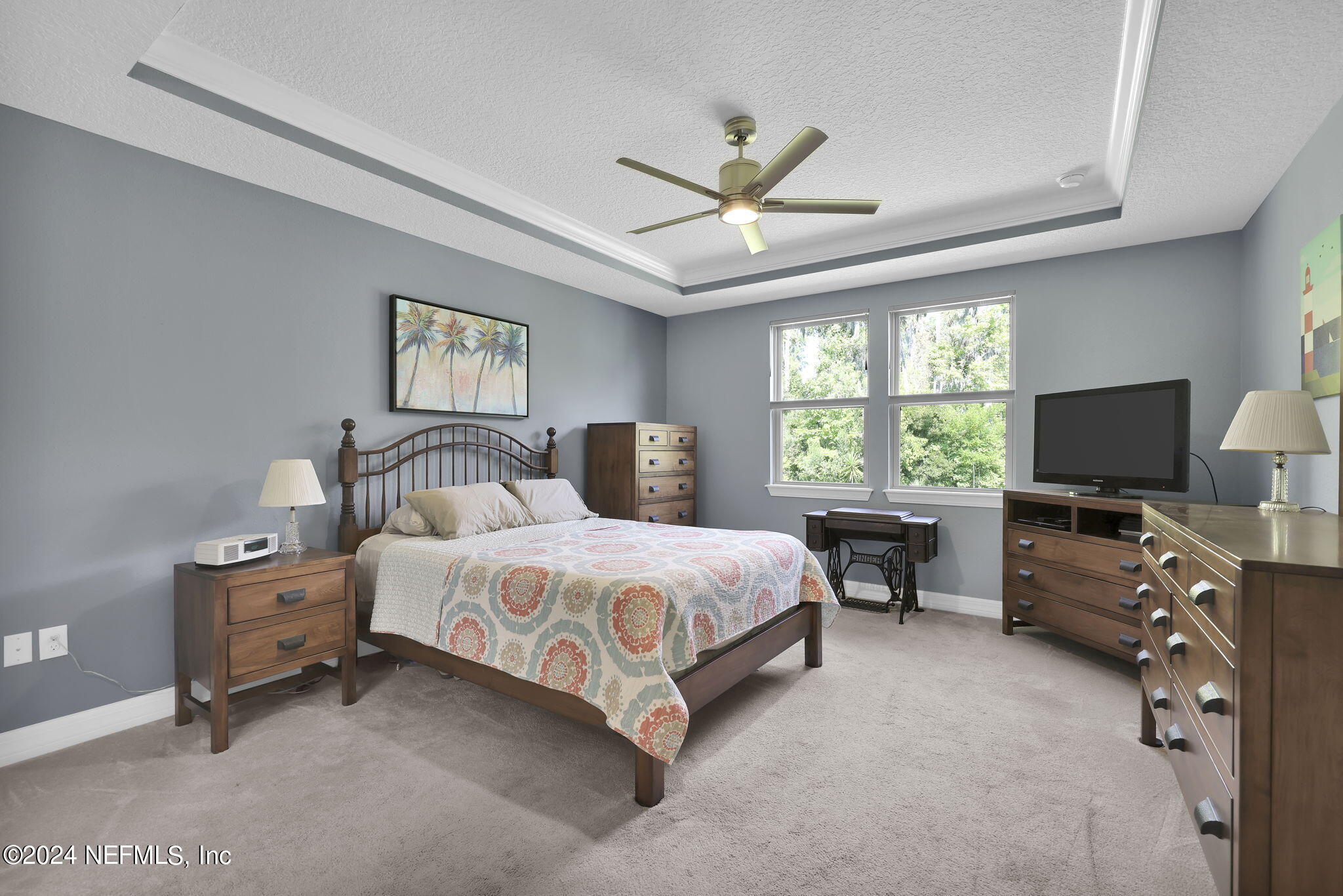 48 Eagle Crest Lane Ponte Vedra, FL 32081 - Photo 17 of 94 a spacious bedroom with a bed and a flat screen tv