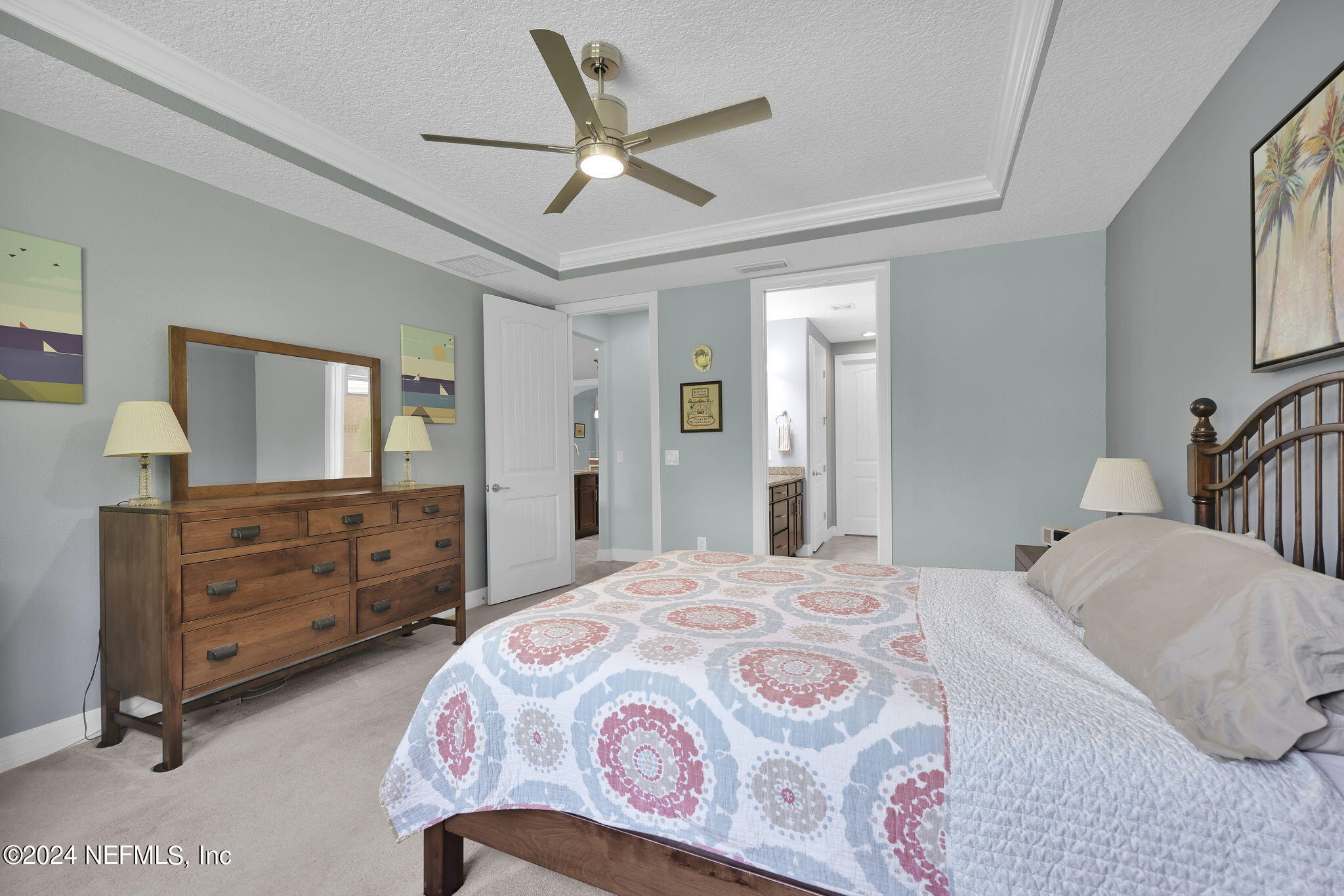 48 Eagle Crest Lane Ponte Vedra, FL 32081 - Photo 18 of 94 a bedroom with a bed and a dresser