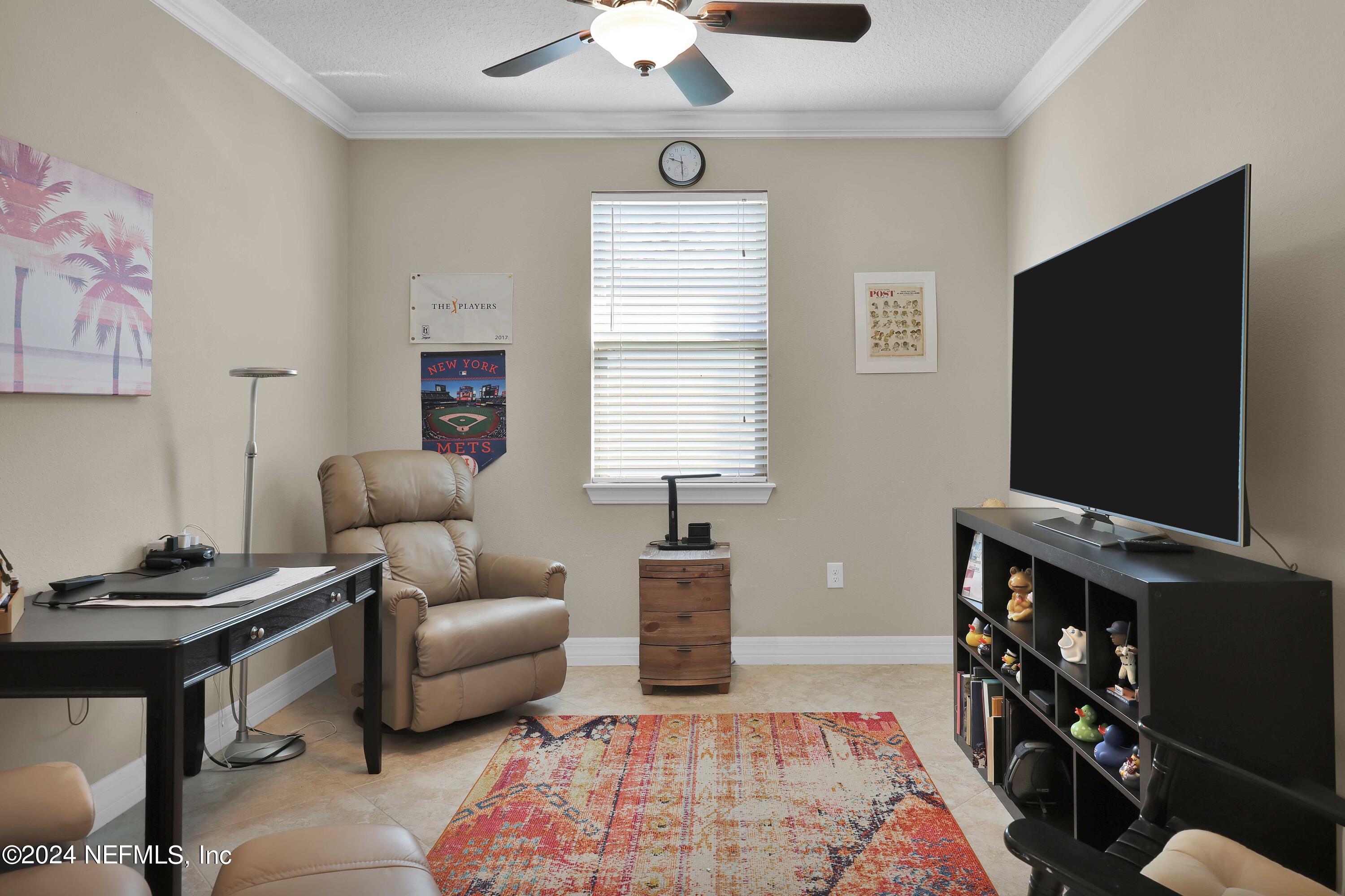 48 Eagle Crest Lane Ponte Vedra, FL 32081 - Photo 25 of 94 a bedroom with furniture and a flat screen tv