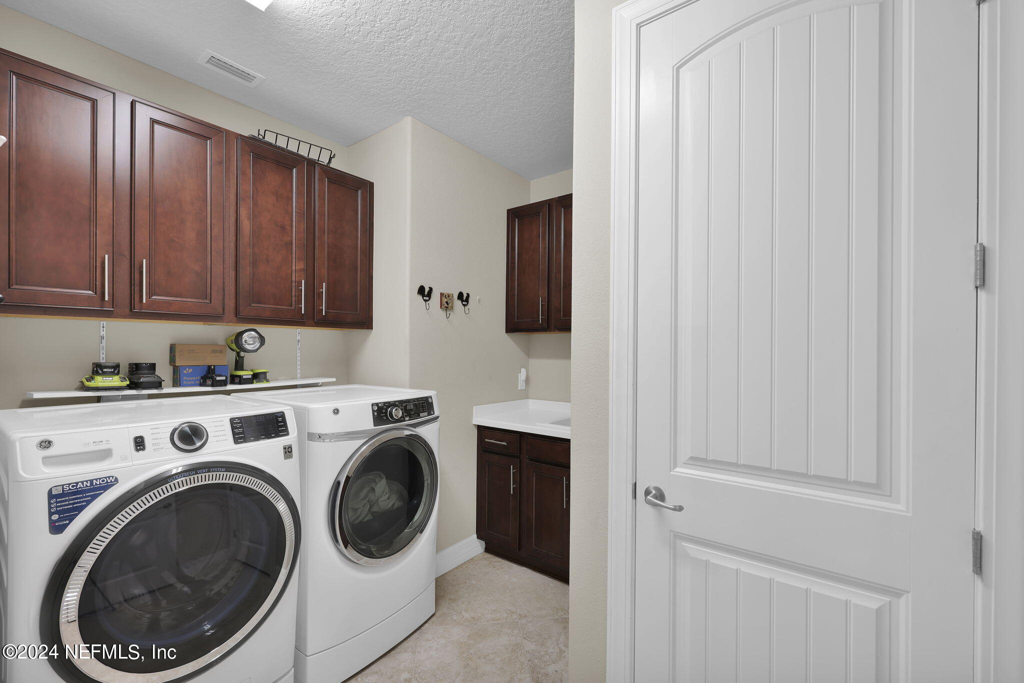 48 Eagle Crest Lane Ponte Vedra, FL 32081 - Photo 30 of 94 a utility room with sink dryer and washer