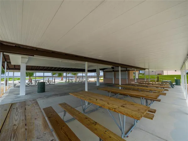 a view of a swimming pool with a yard