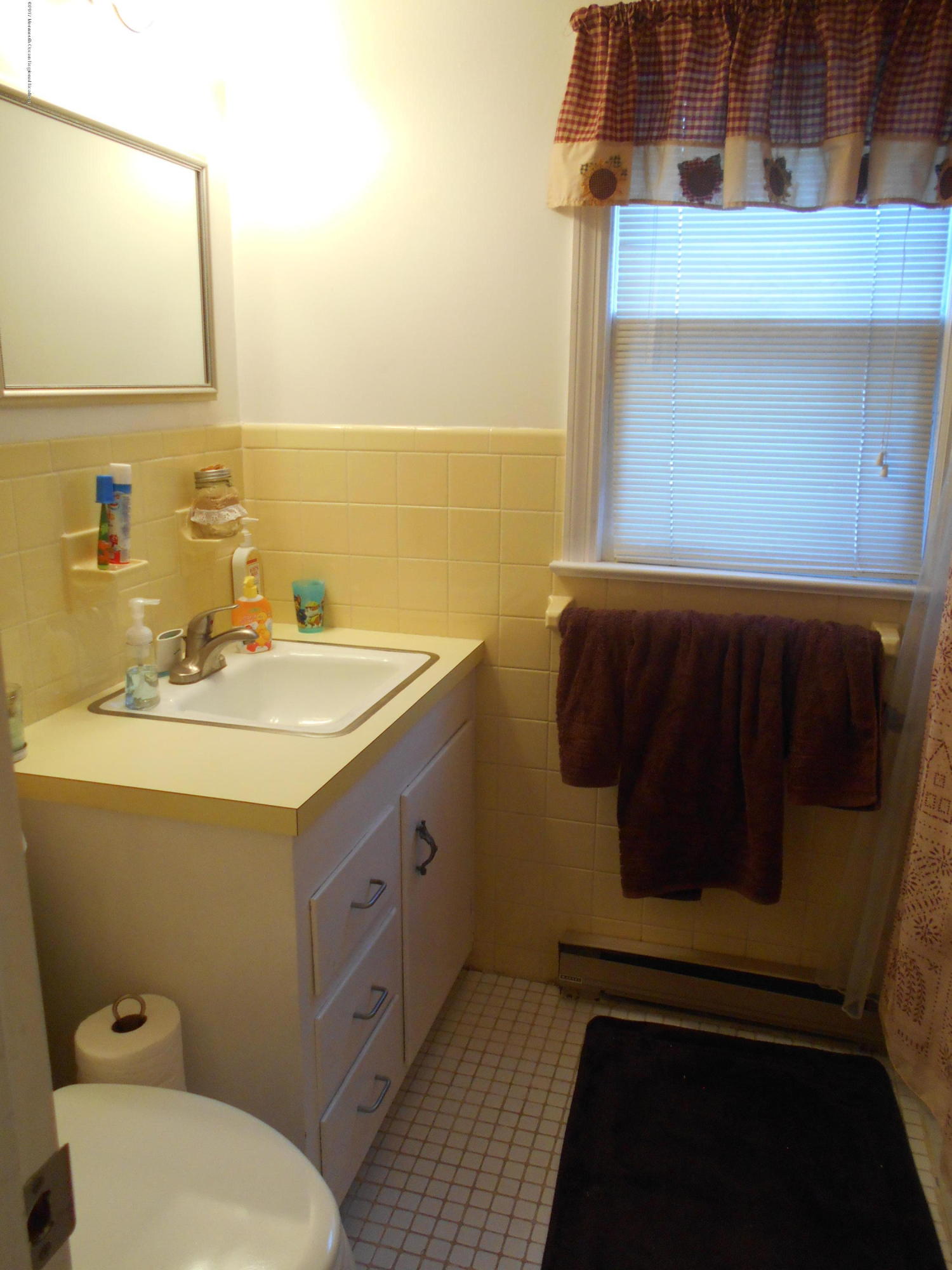 28 Hulse Landing Road Brick, NJ 08723 - Photo 11 of 19 a bathroom with a sink and a mirror