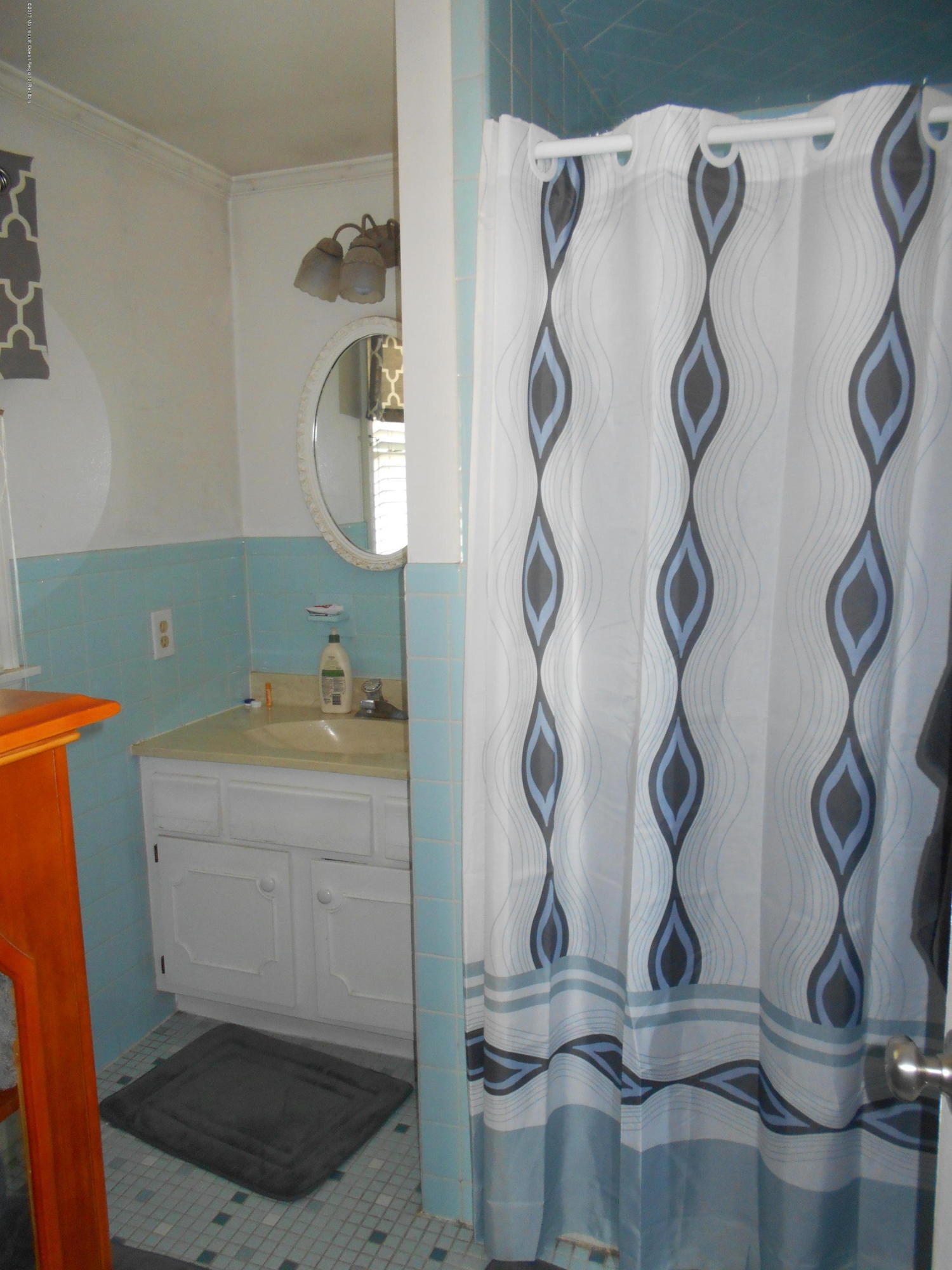 28 Hulse Landing Road Brick, NJ 08723 - Photo 10 of 19 a bathroom with a shower and a mirror