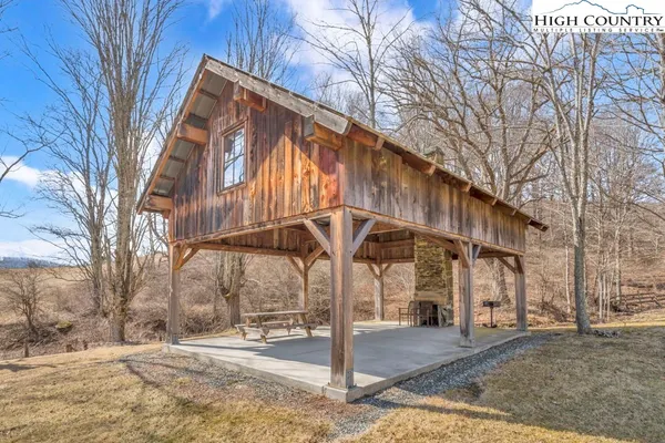 a view of swimming pool with a yard