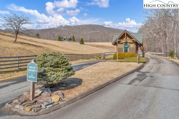 a view of a pathway with a building in the background