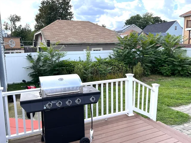 a view of a wooden bench on the deck