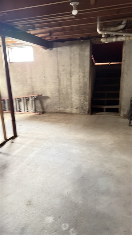 930 Sea Street Quincy, MA 02169 - Photo 29 of 29 a view of an empty room with a fireplace