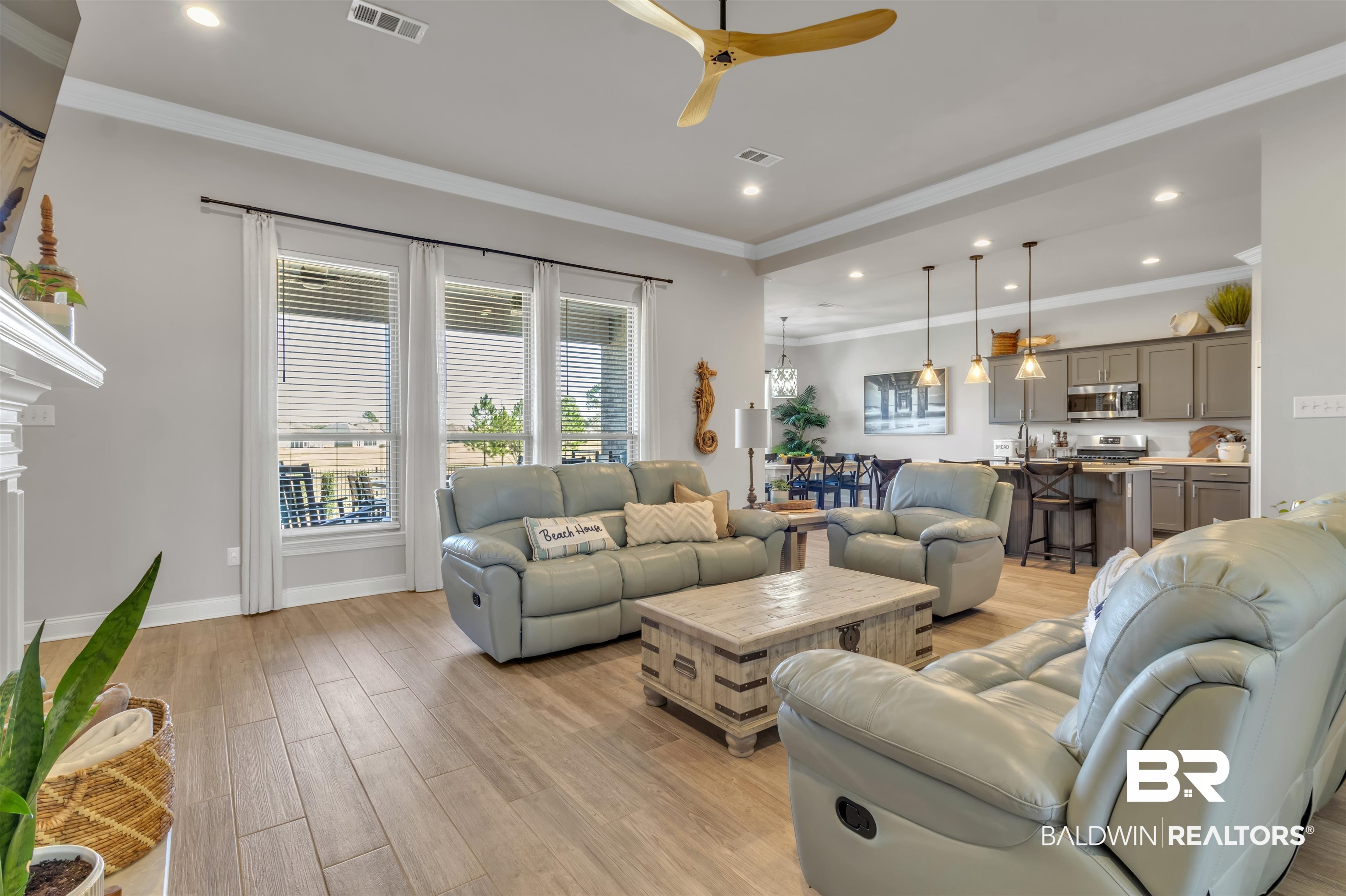 22531 Putter Lane Foley, AL 36535 - Photo 17 of 43 Living room featuring ornamental molding, ceiling fan, light wood-type flooring, and recessed lighting