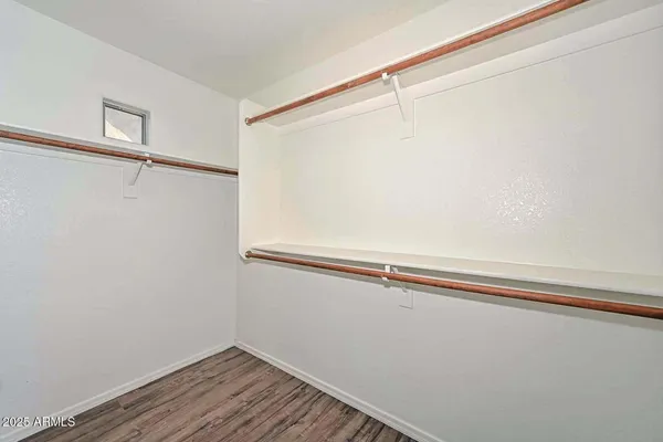 a view of a room with racks on the wall