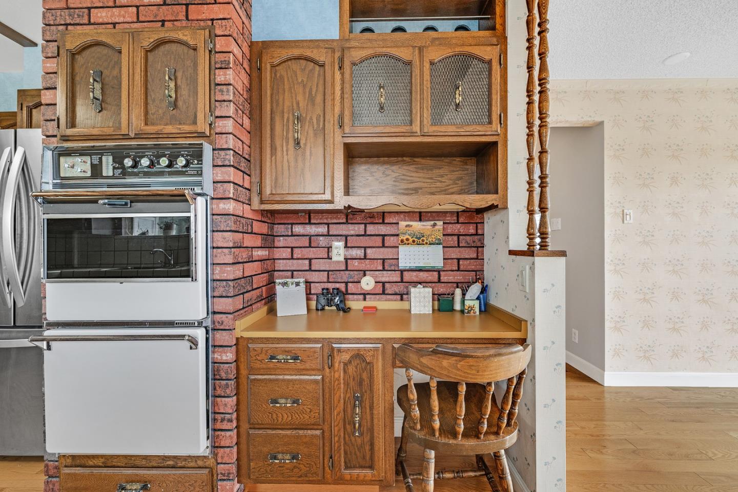 6 Fairview Place Millbrae, CA 94030 - Photo 11 of 19 wooden floor with a stove and a refrigerator