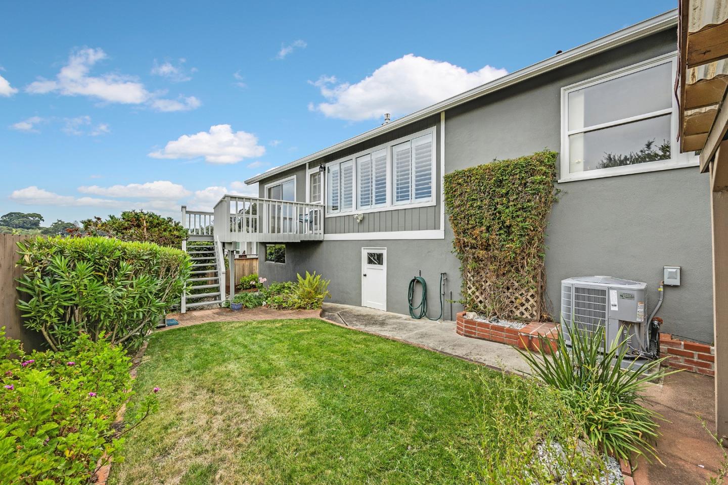 6 Fairview Place Millbrae, CA 94030 - Photo 15 of 19 a front view of a house with garden