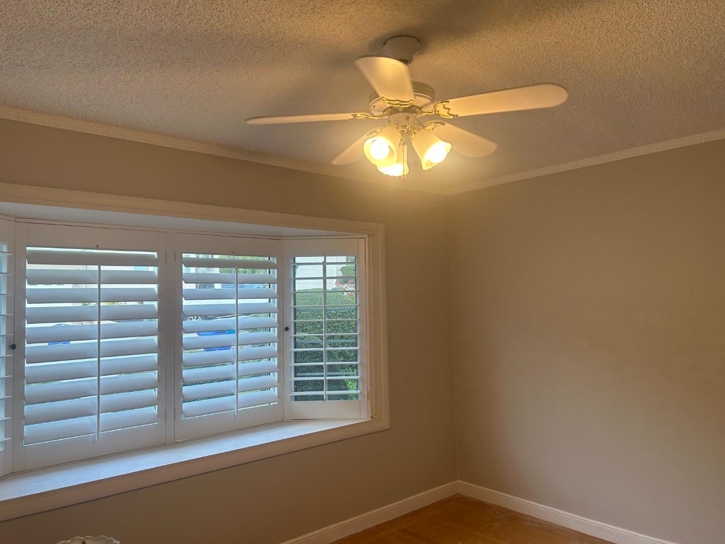 6 Fairview Place Millbrae, CA 94030 - Photo 6 of 19 a view of a livingroom with a ceiling fan and window