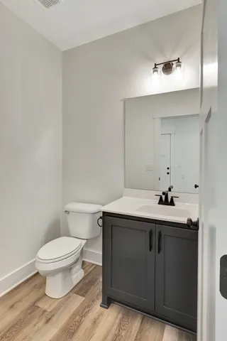 a empty room with a stove and a shower