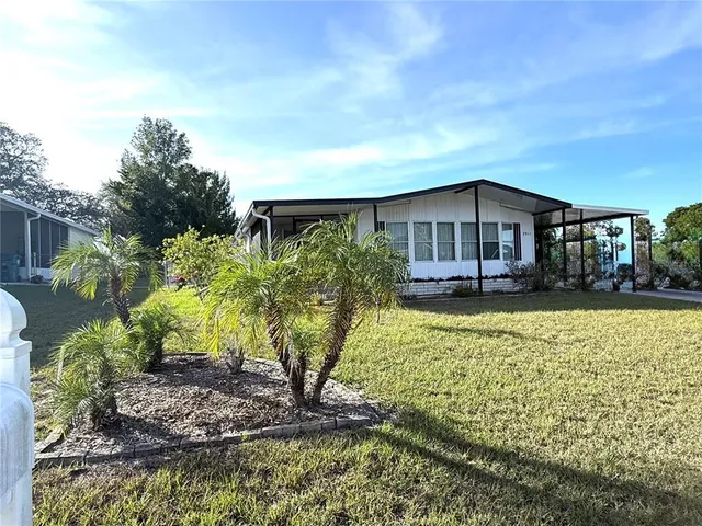 a house view with a garden space