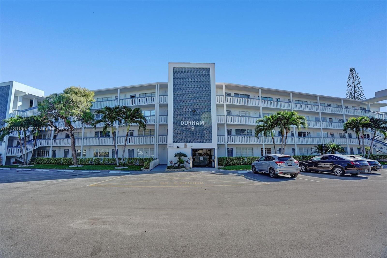 a cars parked in front of a building