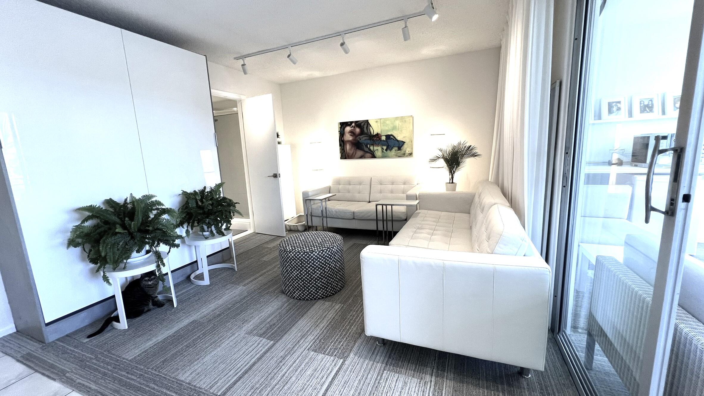 3027 Durham B Deerfield Beach, FL 33442 - Photo 19 of 25 a living room with furniture and a table