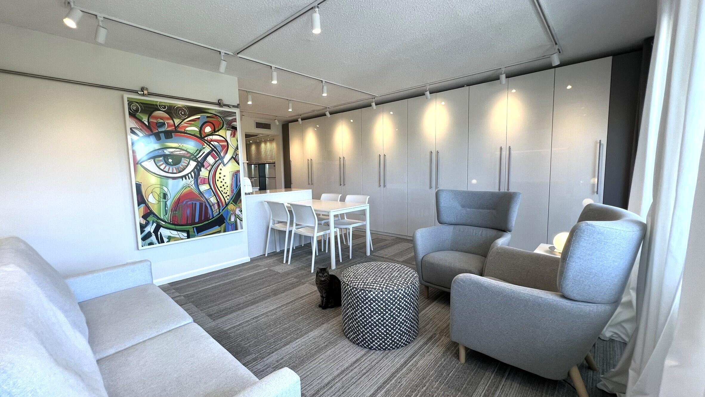 3027 Durham B Deerfield Beach, FL 33442 - Photo 4 of 25 a living room with furniture and painting on the wall