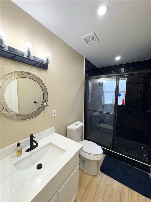 1651 Michigan Avenue Port Isabel, TX 78578 - Photo 11 of 17 a bathroom with a sink a toilet and shower