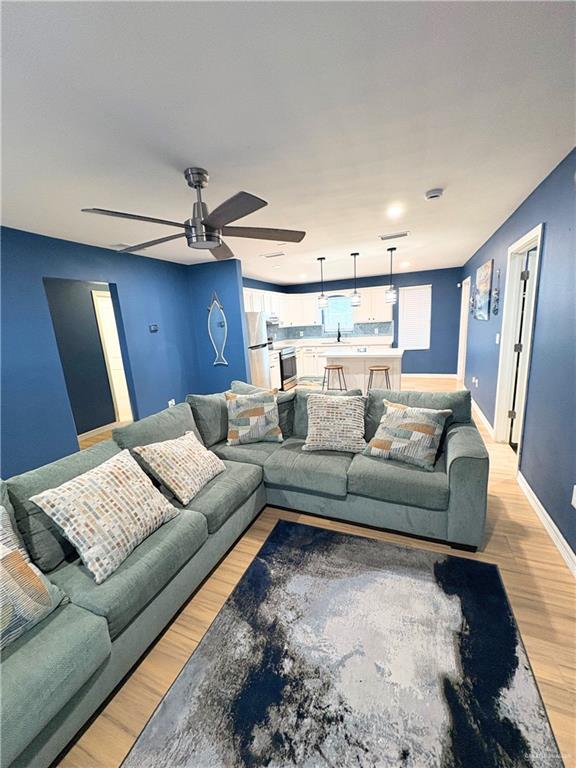 1651 Michigan Avenue Port Isabel, TX 78578 - Photo 3 of 17 a living room with furniture and a rug