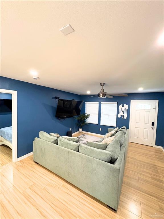 1651 Michigan Avenue Port Isabel, TX 78578 - Photo 6 of 17 a living room with furniture and a fireplace