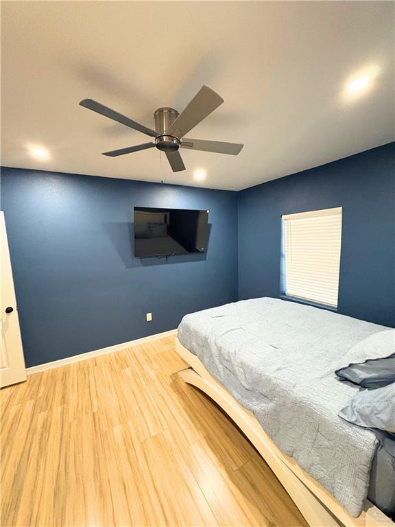 1651 Michigan Avenue Port Isabel, TX 78578 - Photo 7 of 17 a bedroom with a bed and a window