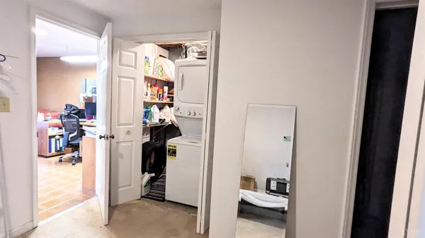 a living room with furniture and a gate