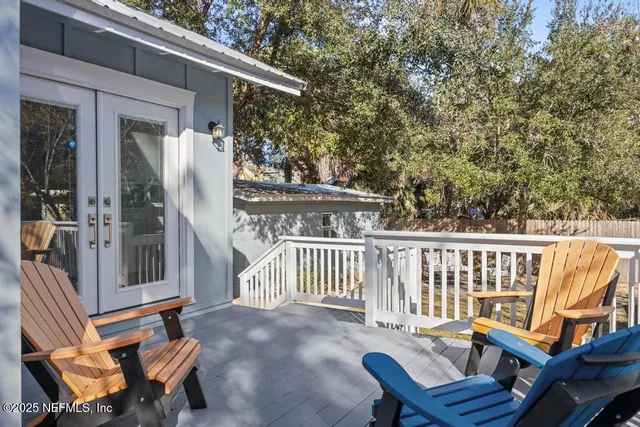 a view of a house with a yard and garage