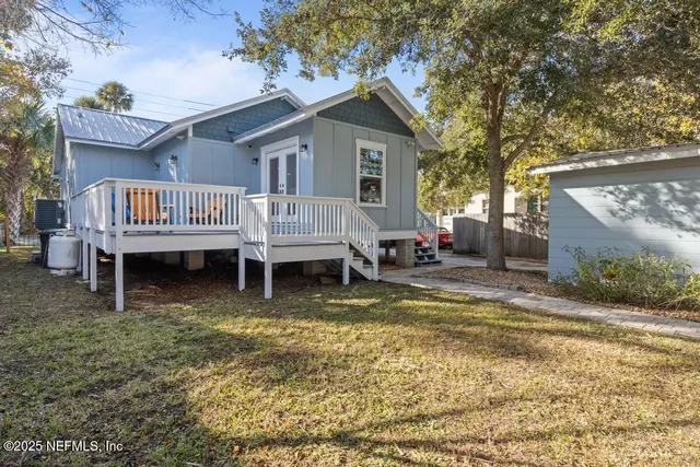 a front view of a house with a garage