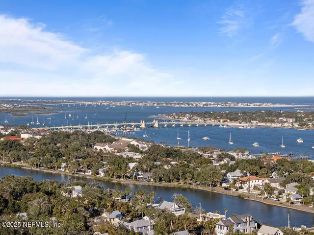 an aerial view of residential building with parking space