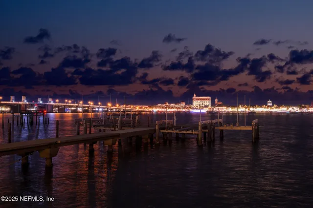 a balcony with furniture and a potted plant